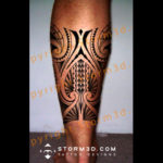 calf-tattoo-symmetrical-wrapping-design