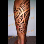 lower-leg-calf-tattoo-design-maori-polynesian-koru-shapes